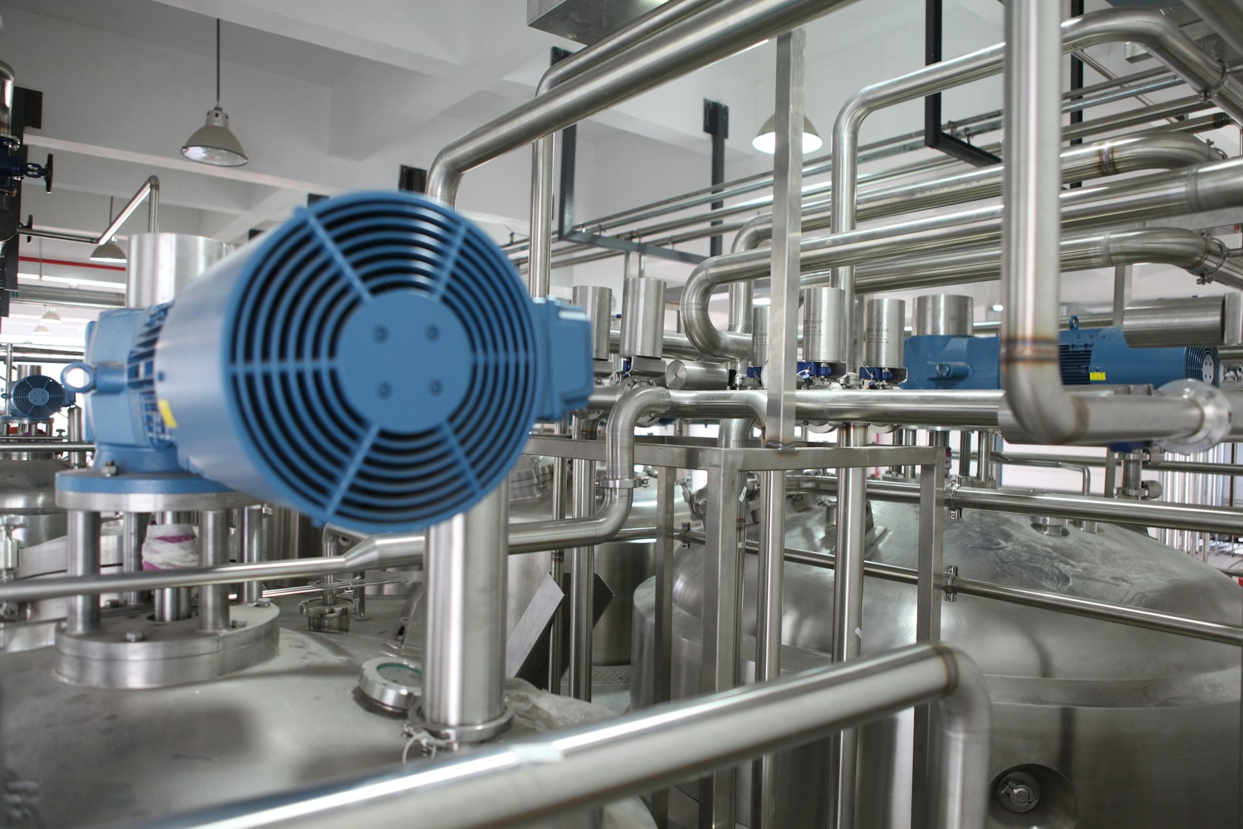 Electric motors connected to stainless pipework